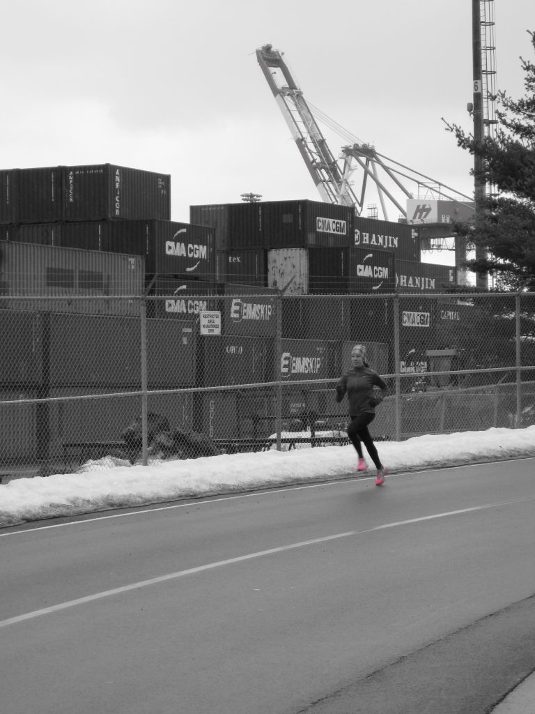 Runner at Halifax Seaport wearing ASICS Speedstars