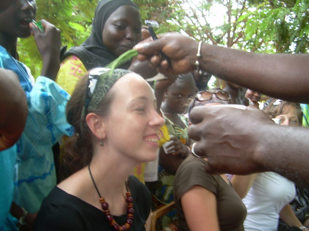 a canadian girl participating in a Muslim Naming Ceremony in The Gambia