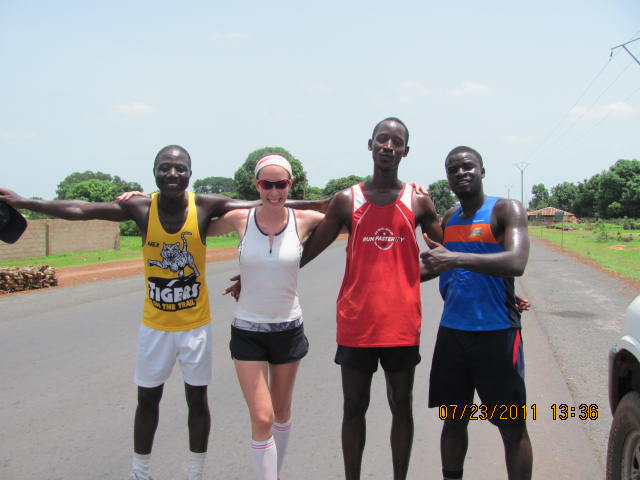 3 Gambian runners and 1 Canadian runner running together