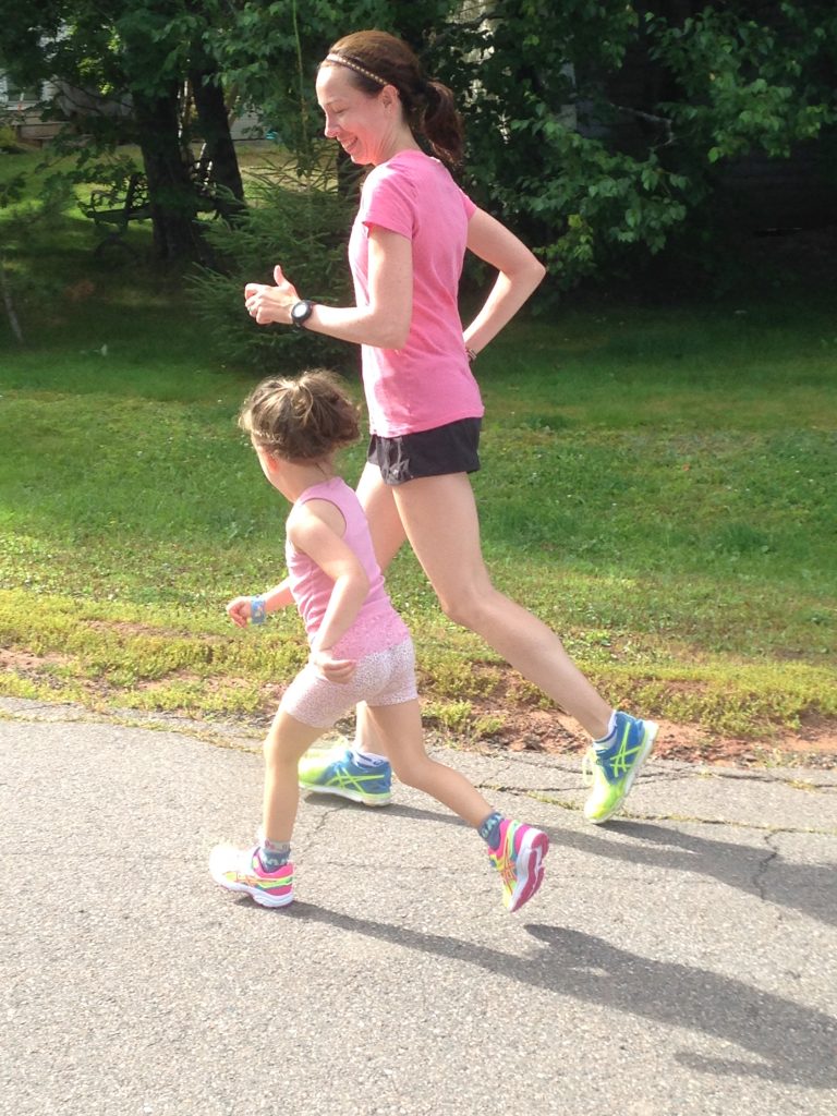 mother Erin Poirier runs with 4 year old daughter